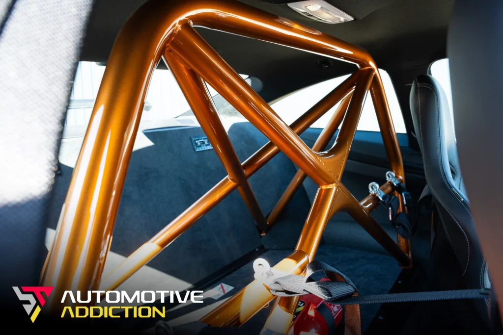bmw m4 gts Roll cage in Acid Orange