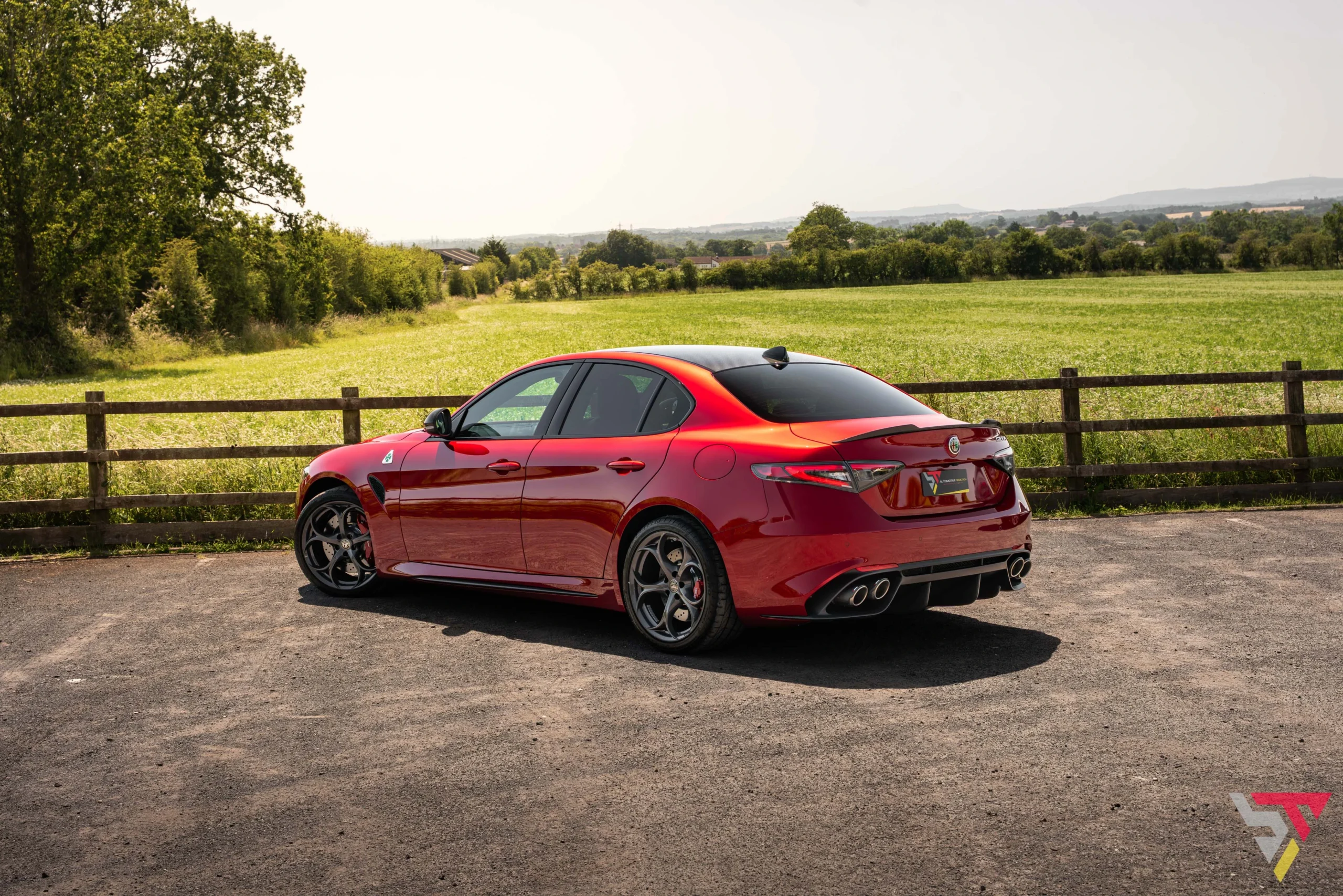 2026 Alfa Romeo Giulia Quadrifoglio Etna Red rear angled