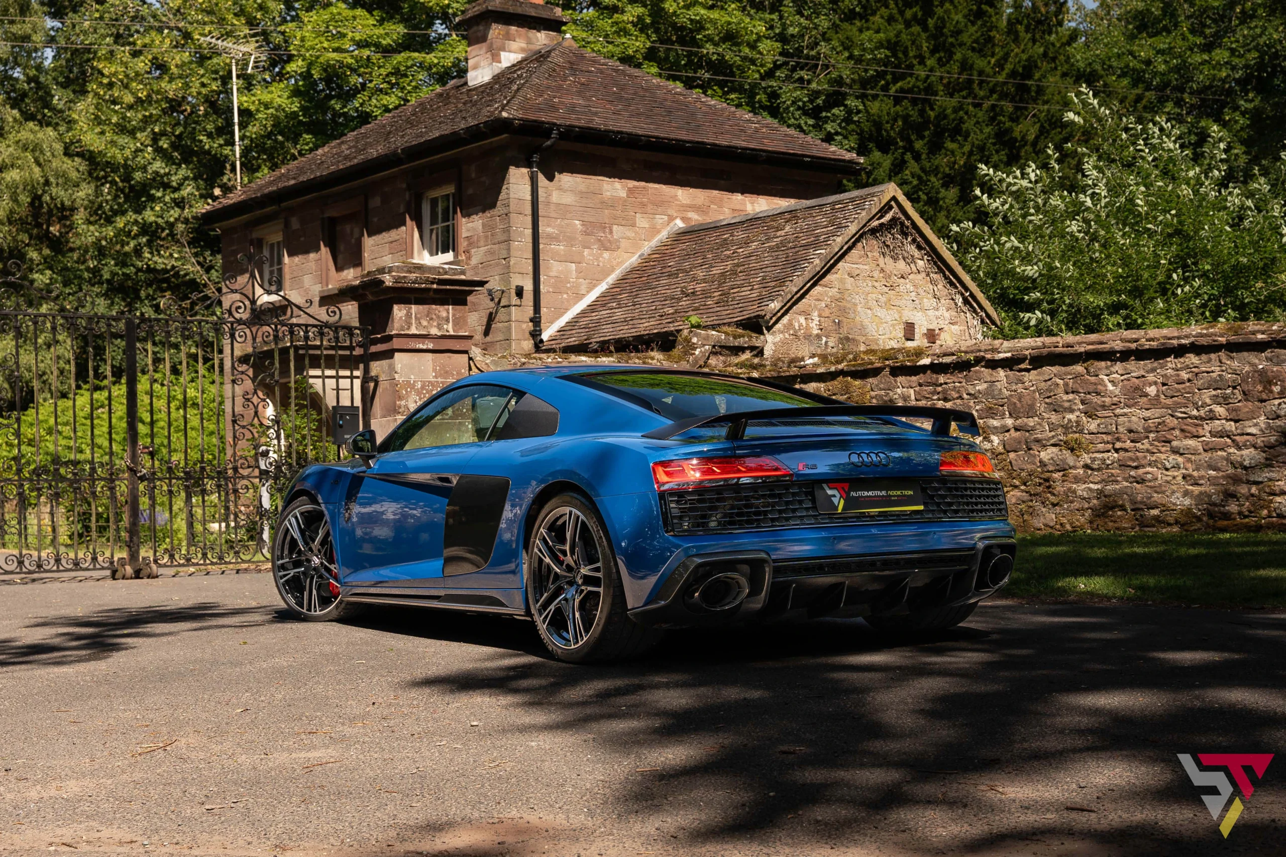 Audi R8 Performance Carbon Black Ascari Blue rear angled