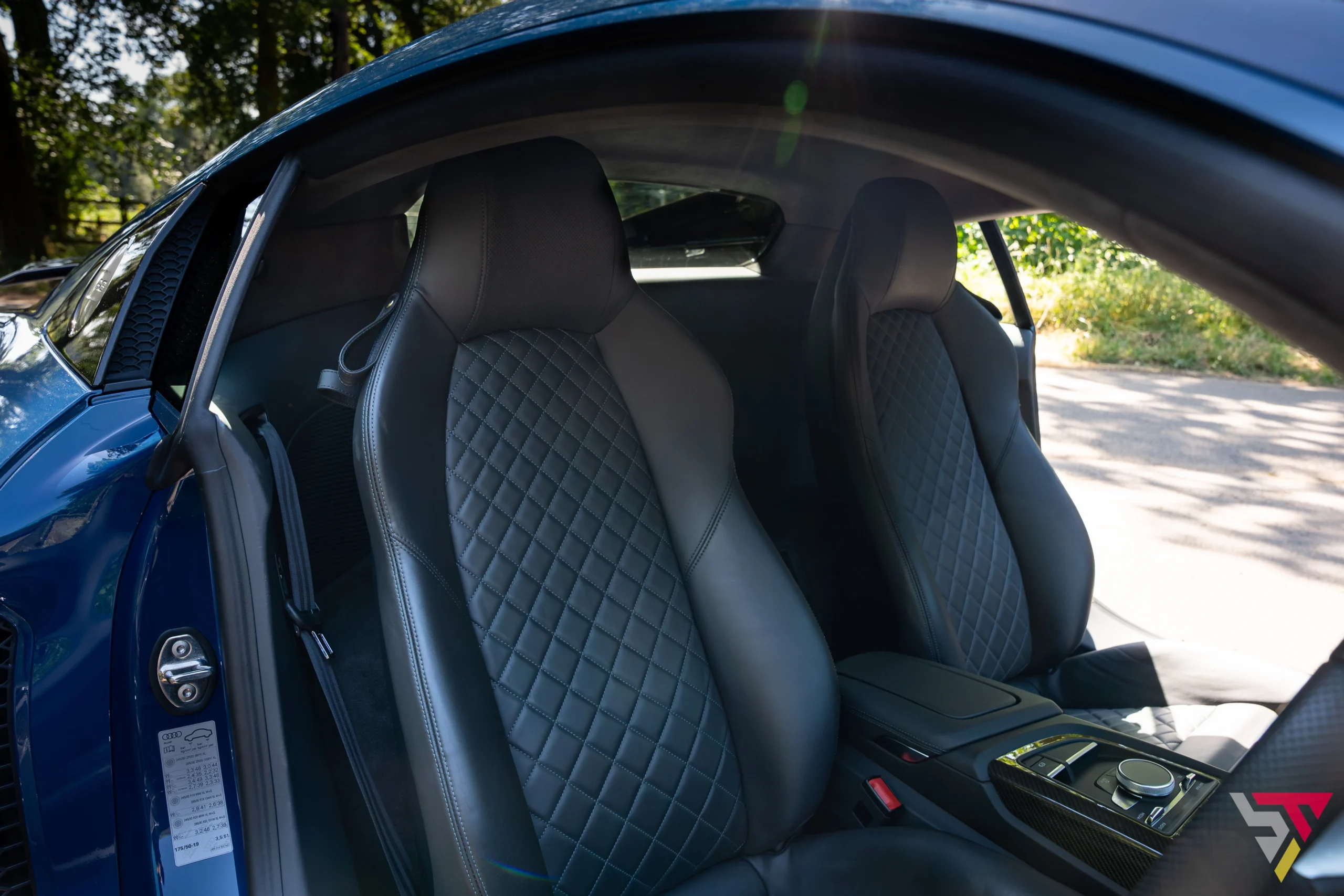 Audi R8 Performance Carbon Black Ascari Blue drivers side seats