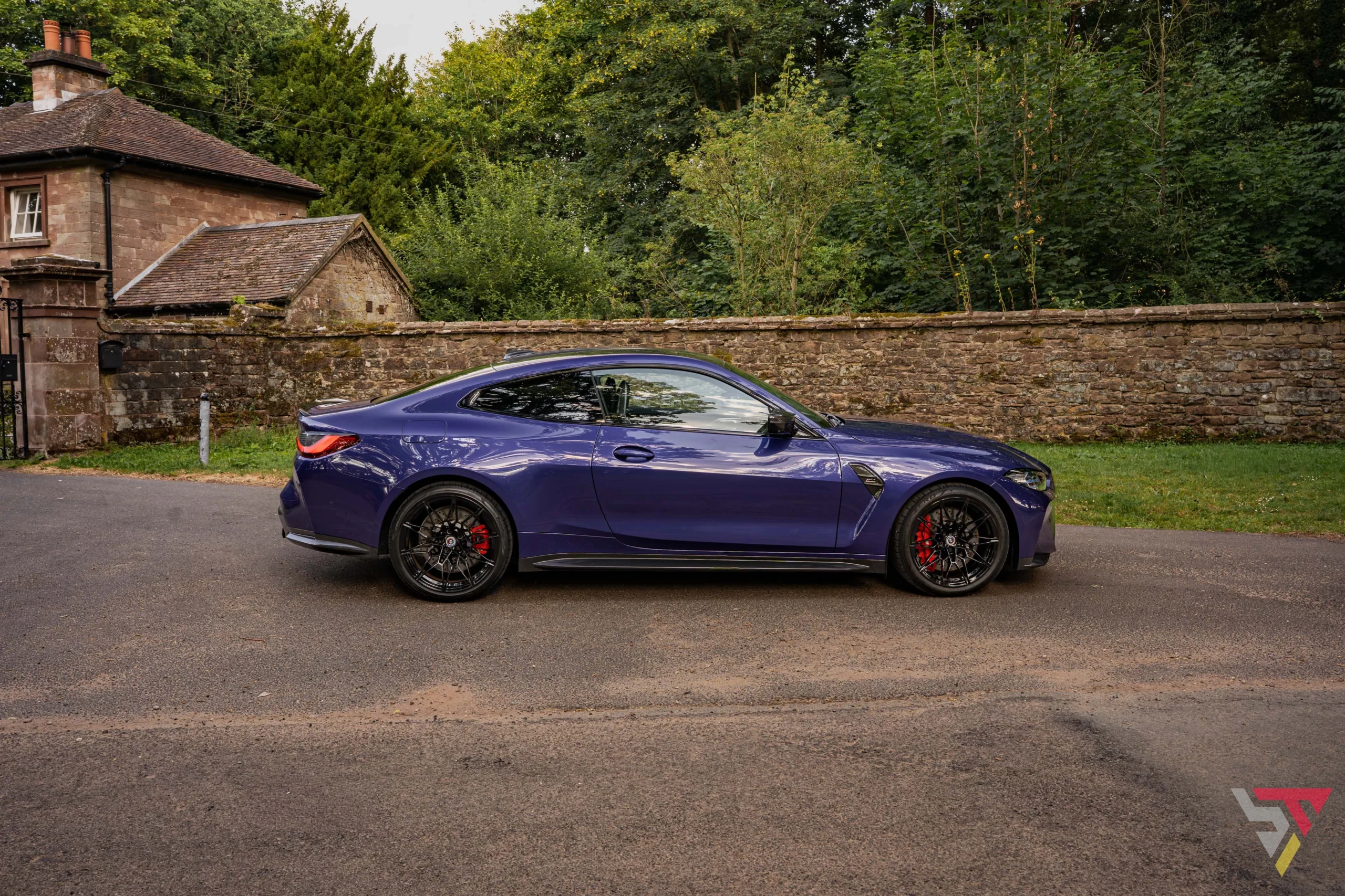BMW Individual G82 M4 Ultimate Package Velvet Blue side