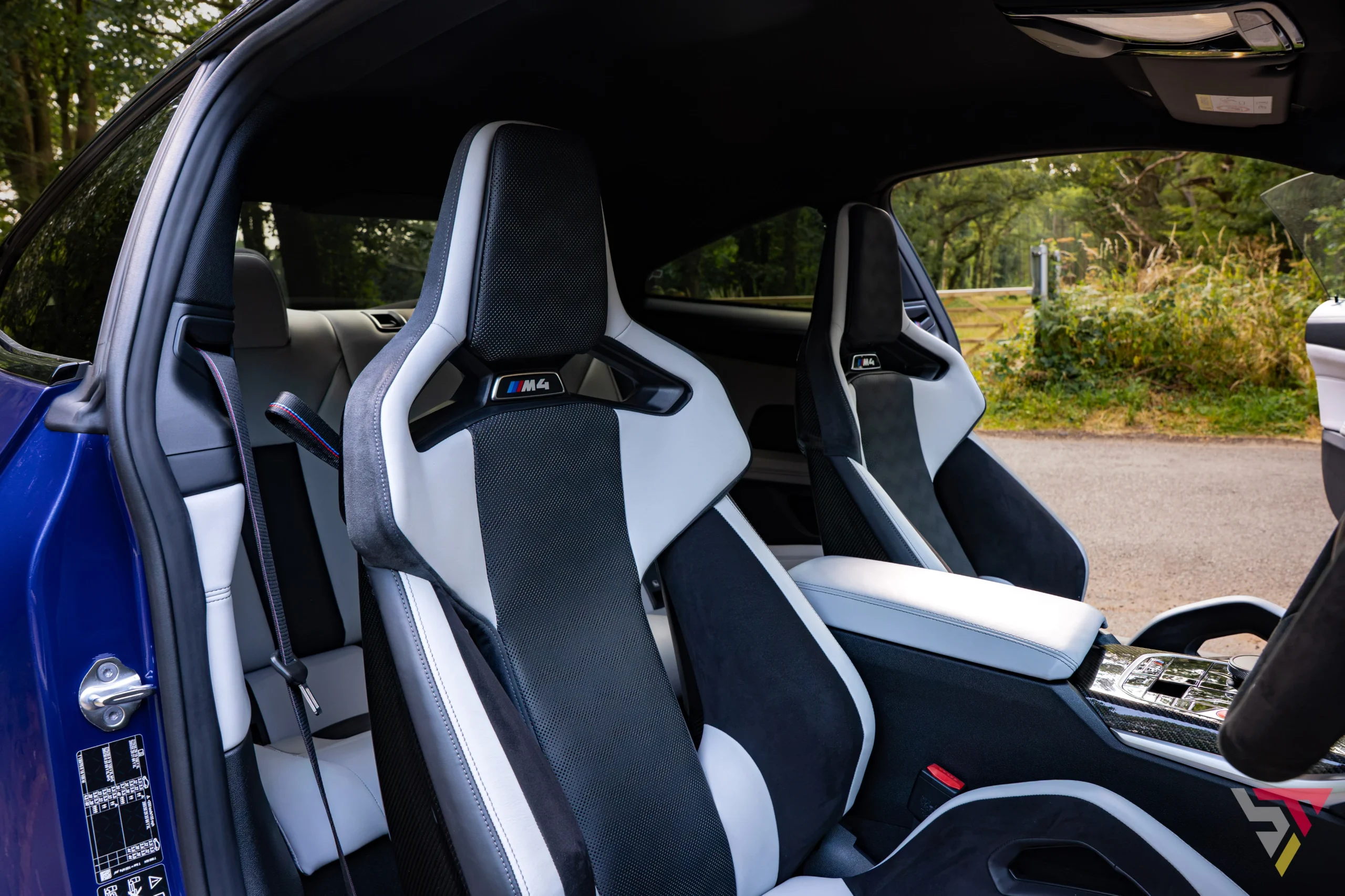 BMW Individual G82 M4 Ultimate Package Velvet Blue bucket seats