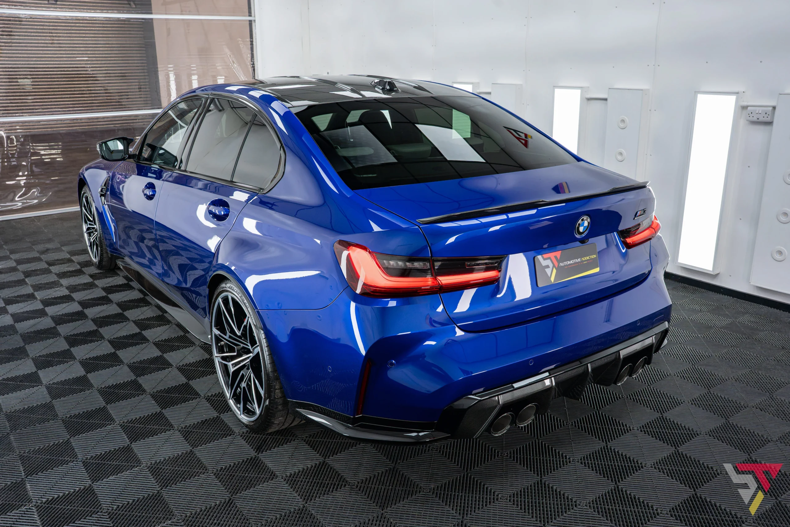 BMW M3 G80 Individual San Marino Blue Rear angled
