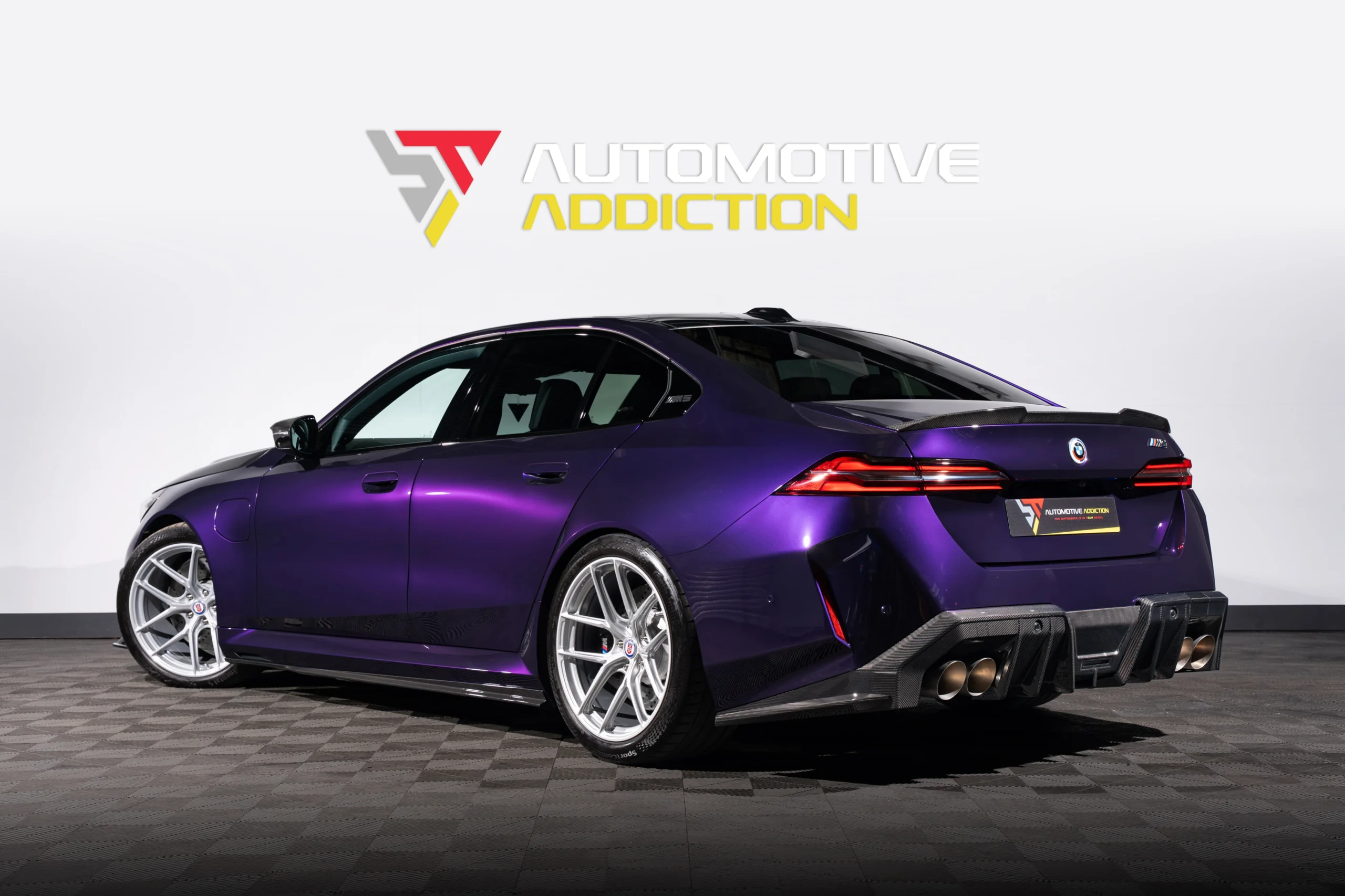 BMW M5 G90 AUTOID Build Midnight Purple For Sale UK Used rear angled
