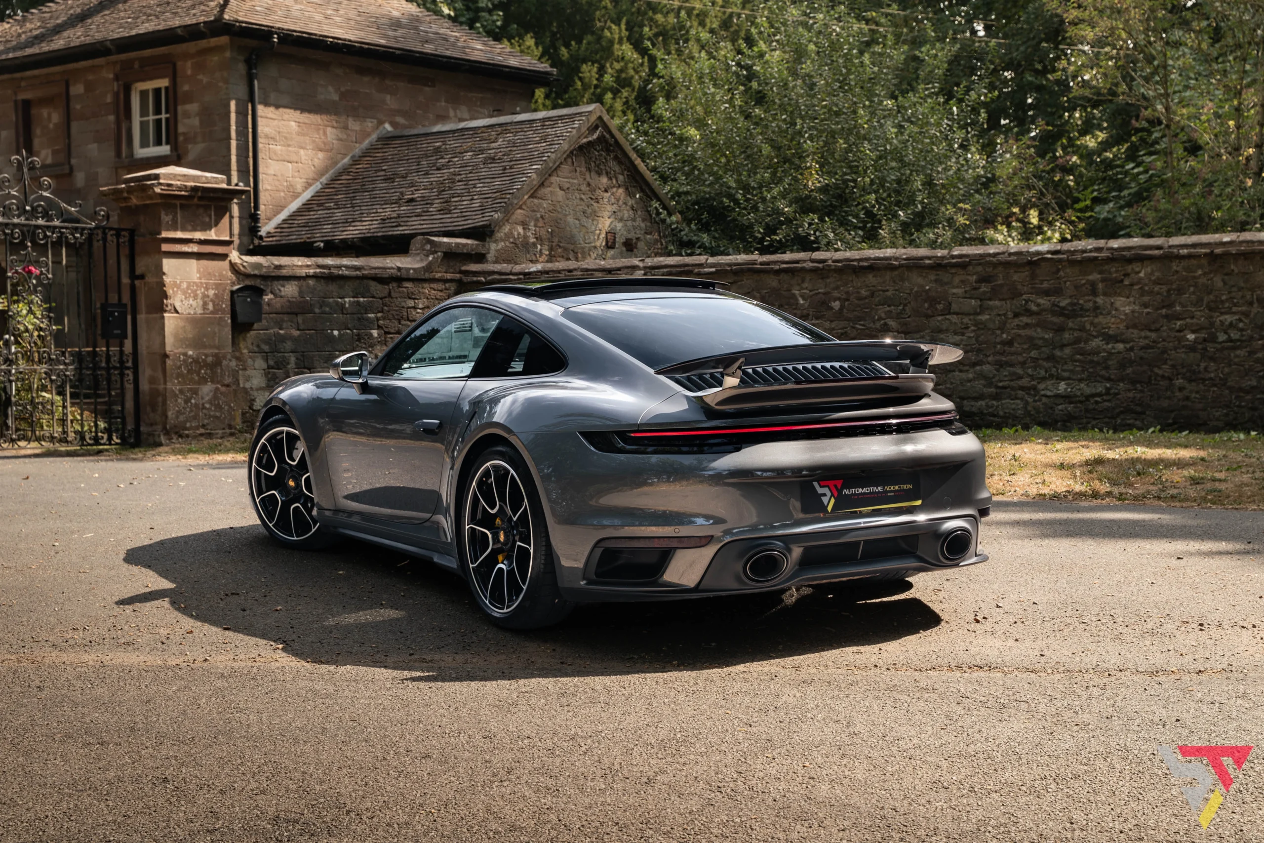 Porsche 992 911 Turbo S Agate Grey Exclusive Manufaktur Interior rear angled