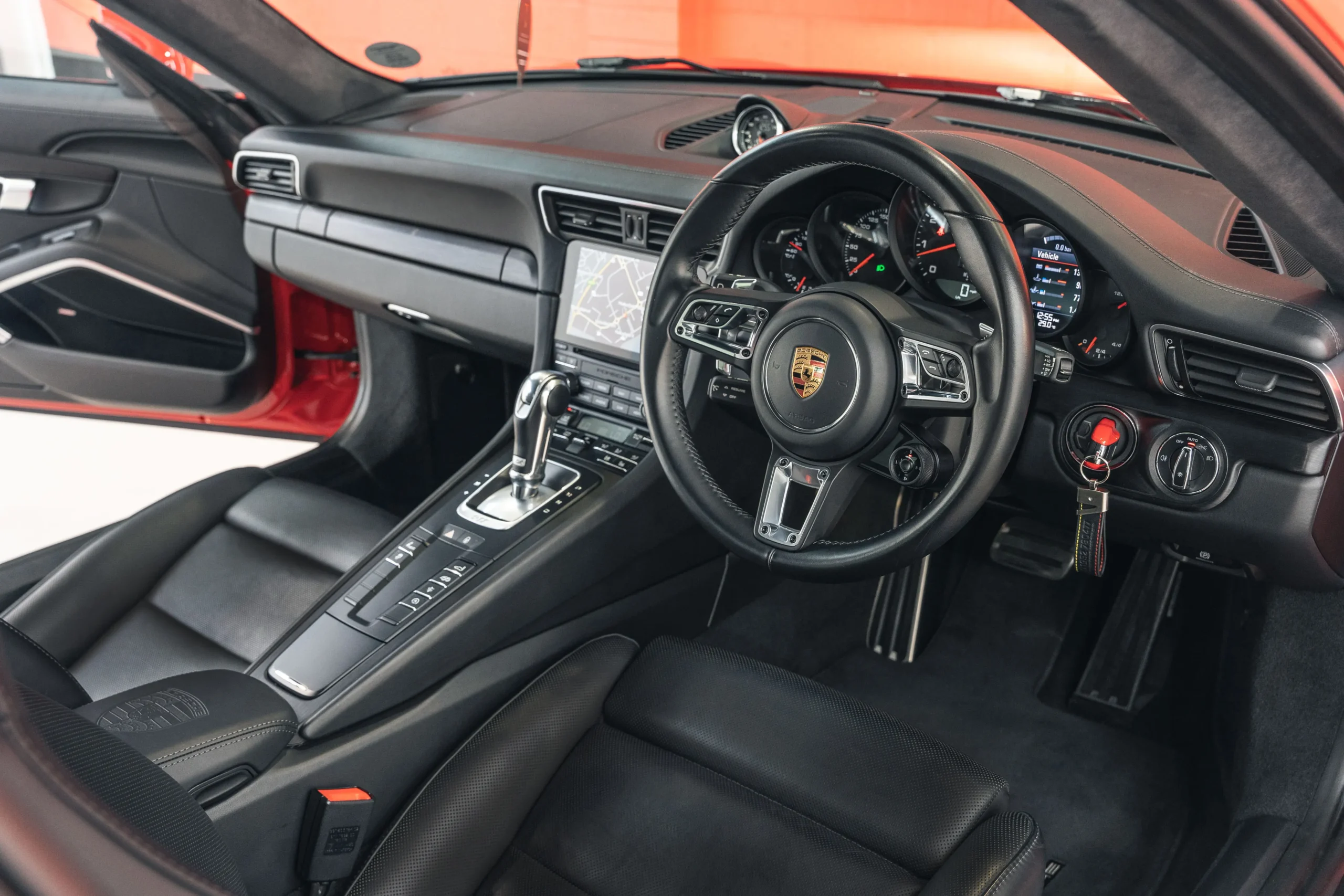 Porsche 911 991.2 Carrera 4 GTS Guards Red drivers dash