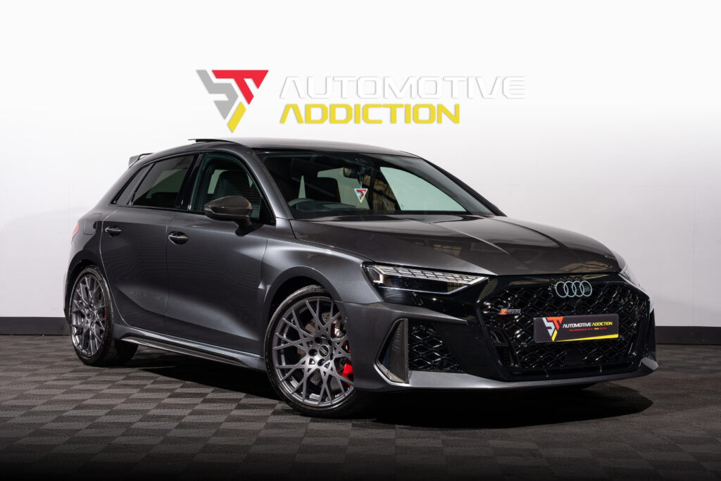 2025 Audi RS3 Carbon Black 8.5Y Sportback Daytona Grey front angled