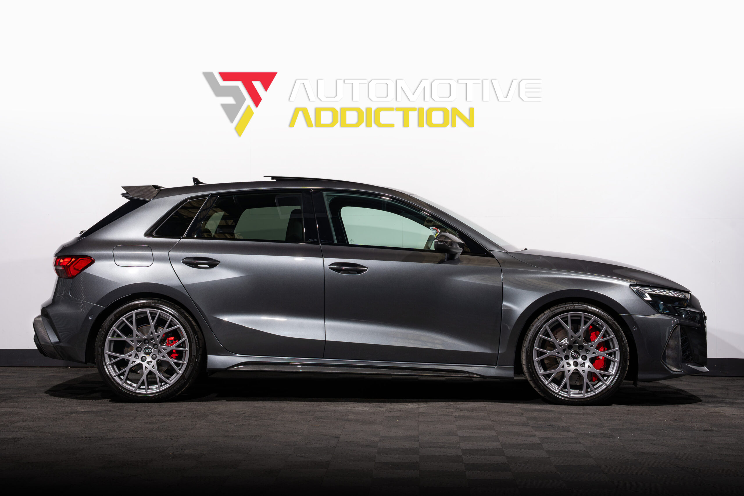2025 Audi RS3 Carbon Black 8.5Y Sportback Daytona Grey side