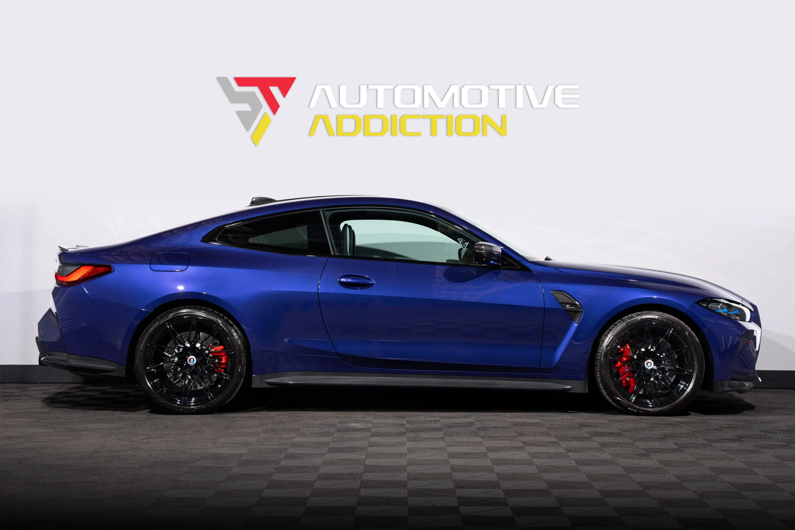 BMW Individual G82 M4 Ultimate Package Velvet Blue Side