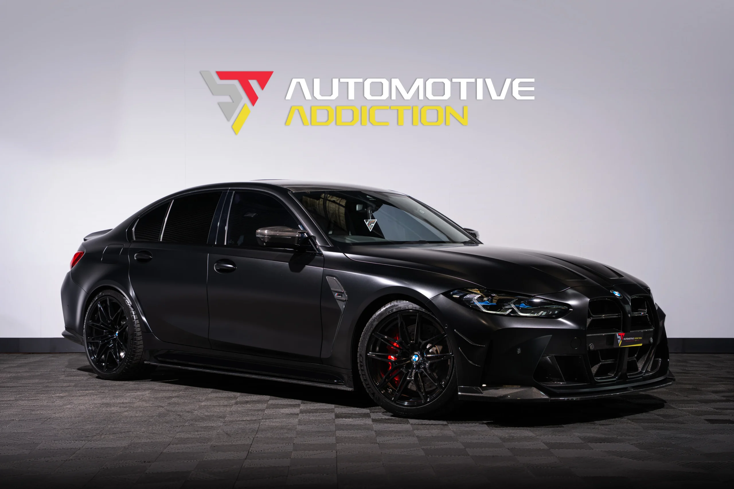 BMW M3 G80 Stage 2 Frozen Black BMW Individual Evolve Automotive 750PS front angled