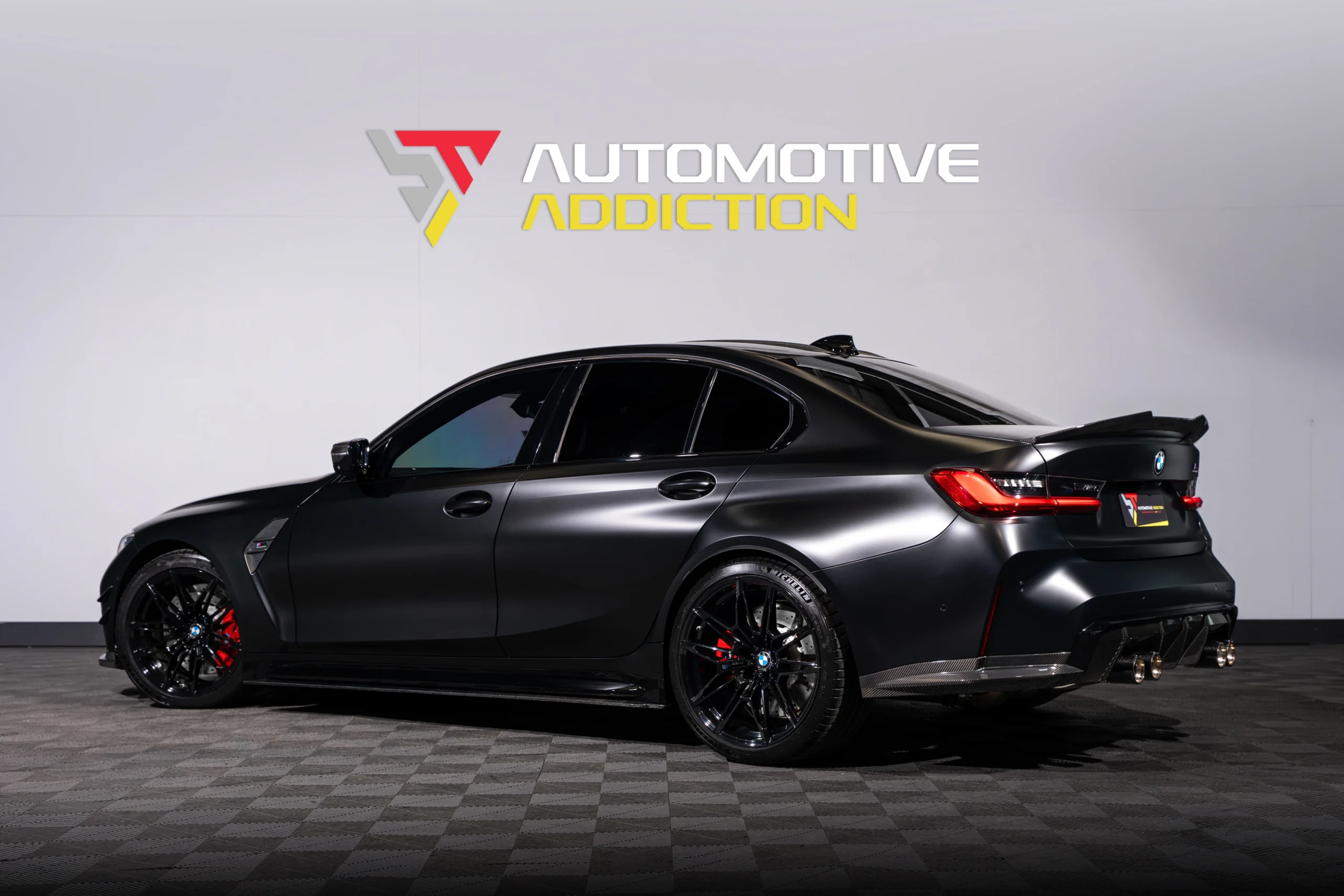 BMW M3 G80 Stage 2 Frozen Black BMW Individual Evolve Automotive 750PS rear angled
