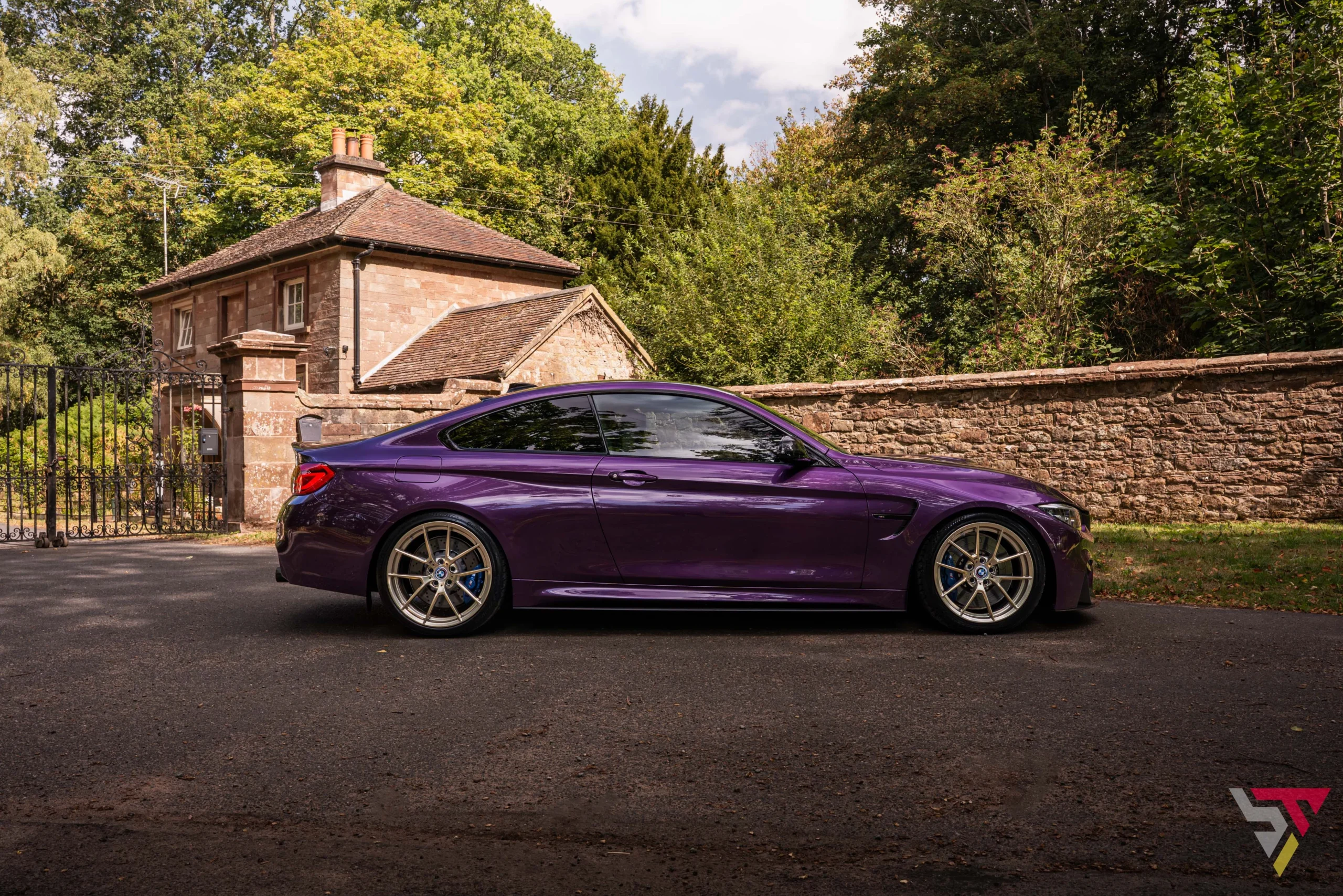 Purple Silk BMW M4 F82 Competition with Frozen Gold 763M Wheels Side