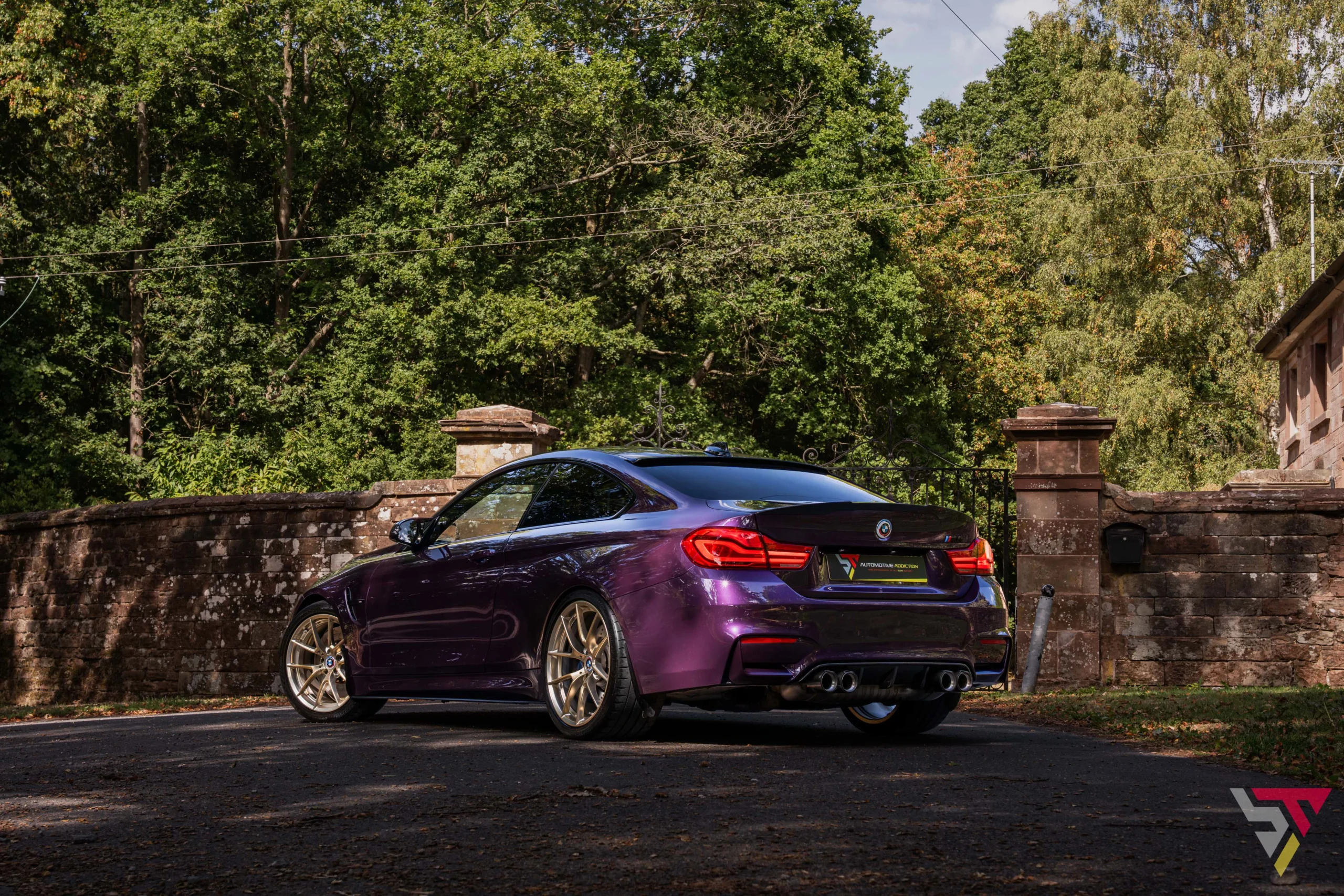 Purple Silk BMW M4 F82 Competition with Frozen Gold 763M Wheels Rear Quarter