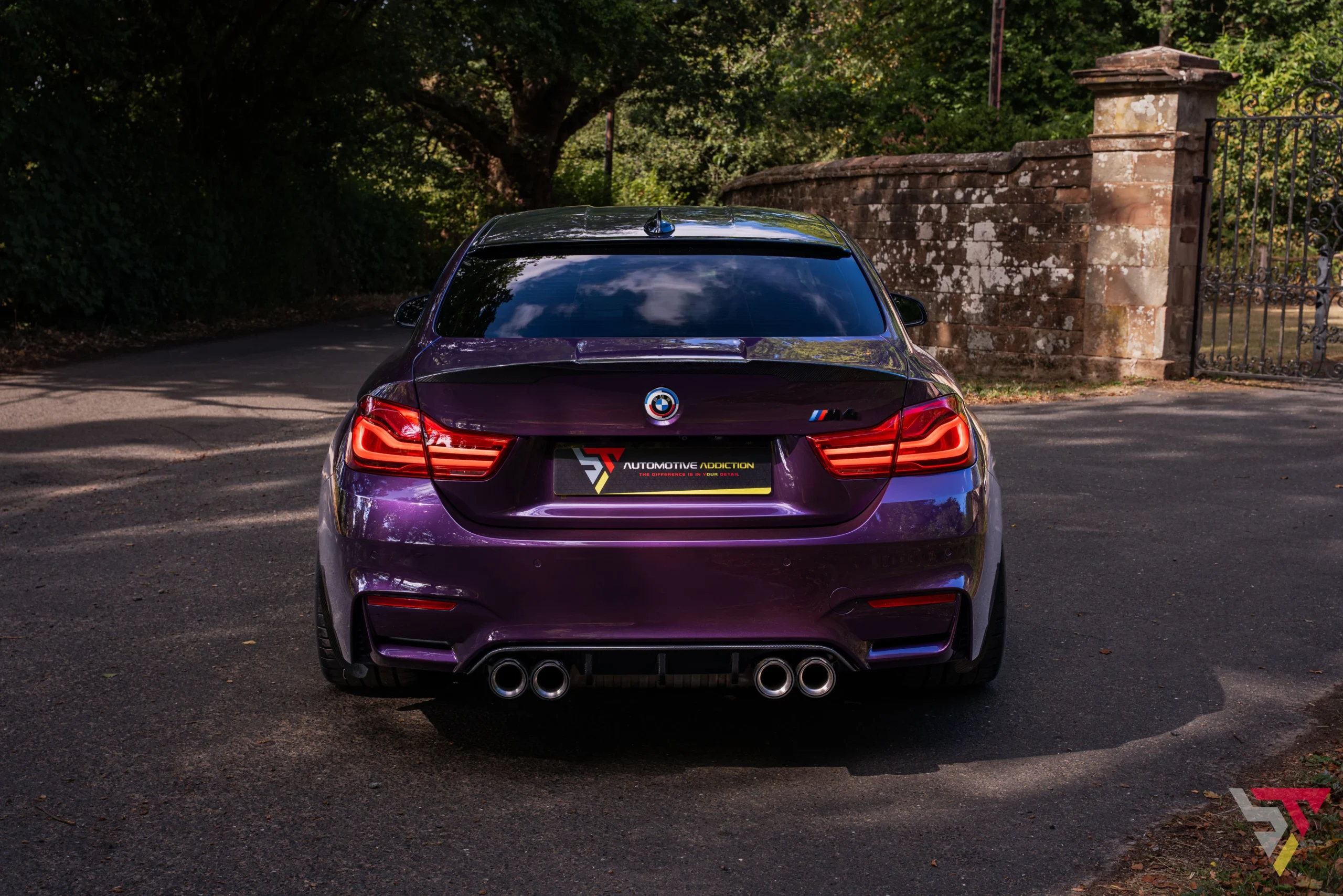 Purple Silk BMW M4 F82 Competition with Frozen Gold 763M Wheels Rear