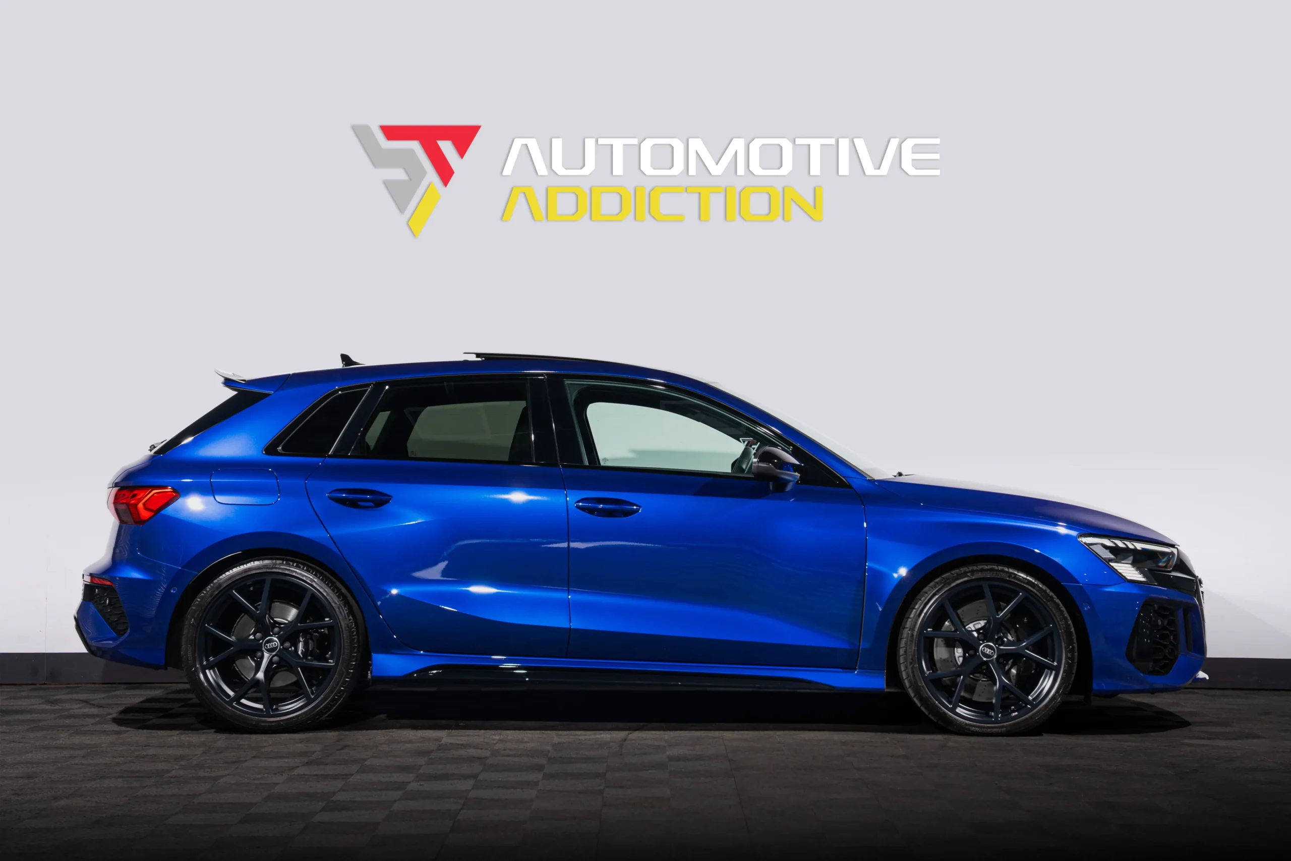 BMW San Marino Blue Audi RS3 Sportback Side